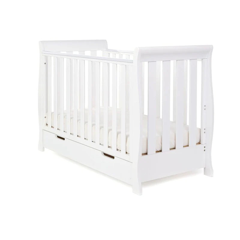 The cot bed of the White Obaby Stamford Mini 3 Piece Room Set | Nursery Furniture Sets | Room Sets | Nursery Furniture - Clair de Lune UK