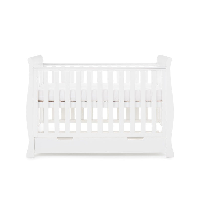  The white Obaby Stamford Mini Sleigh Cot Bed as a crib | Cots, Cot Beds, Toddler & Kid Beds | Nursery Furniture - Clair de Lune UK