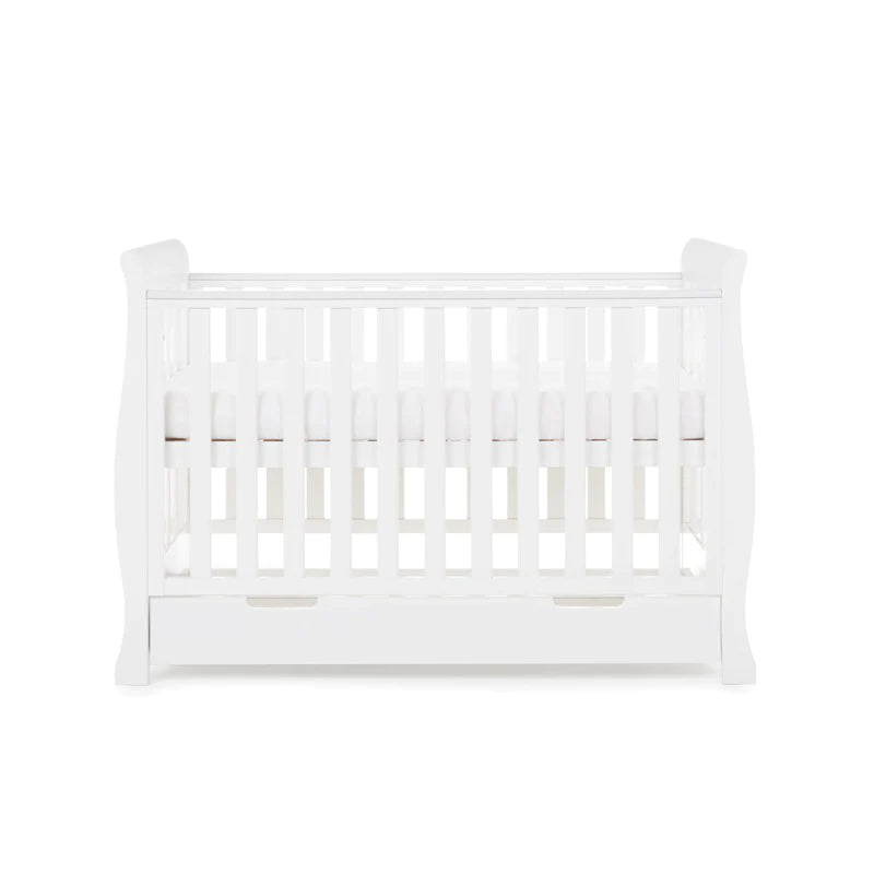 The cot bed of the White Obaby Stamford Mini 3 Piece Room Set as a crib | Nursery Furniture Sets | Room Sets | Nursery Furniture - Clair de Lune UK