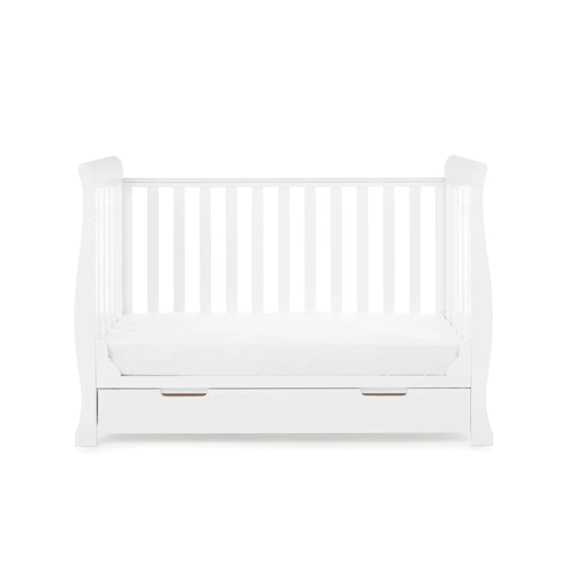 The cot bed of the White Obaby Stamford Mini 3 Piece Room Set without a side wall | Nursery Furniture Sets | Room Sets | Nursery Furniture - Clair de Lune UK