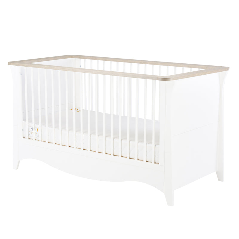 The cot bed as a crib of the White and Ash CuddleCo Clara 2pc Nursery Set - 3 Drawer Dresser/Changer & Cot Bed | Nursery Furniture Sets | Room Sets | Nursery Furniture - Clair de Lune UK