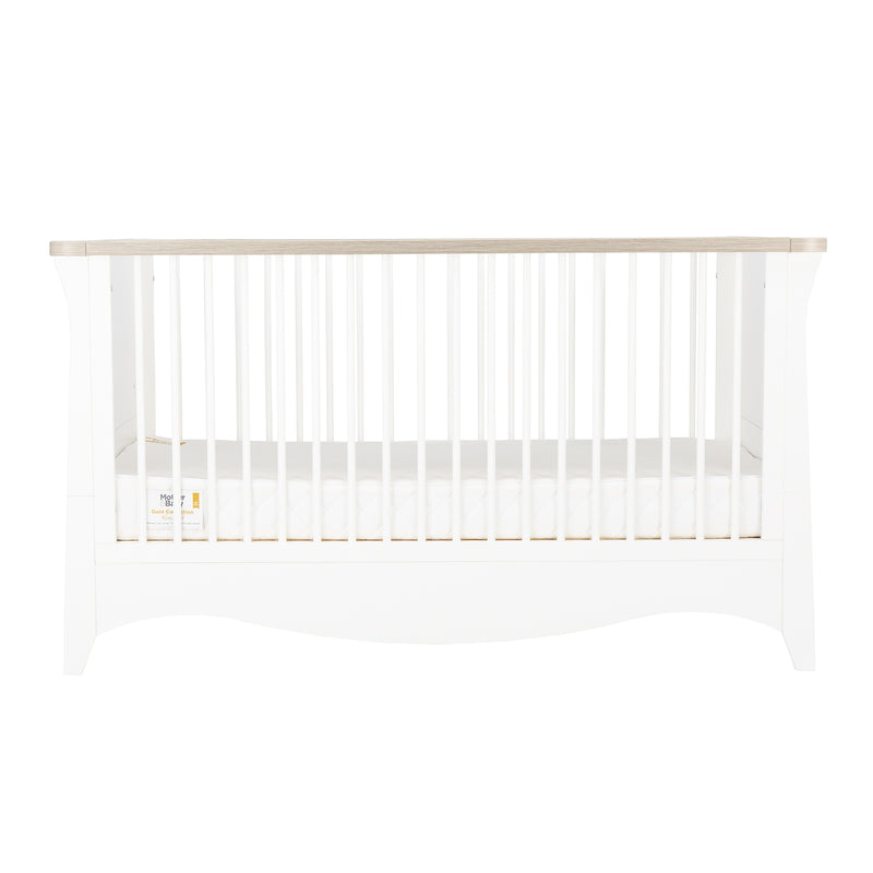 The cot bed of the White and Ash CuddleCo Clara 2pc Nursery Set - 3 Drawer Dresser/Changer & Cot Bed | Nursery Furniture Sets | Room Sets | Nursery Furniture - Clair de Lune UK