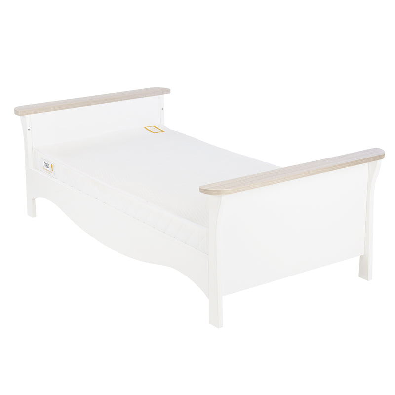 The cot bed as a toddler bed of the White and Ash CuddleCo Clara 2pc Nursery Set - 3 Drawer Dresser/Changer & Cot Bed | Nursery Furniture Sets | Room Sets | Nursery Furniture - Clair de Lune UK