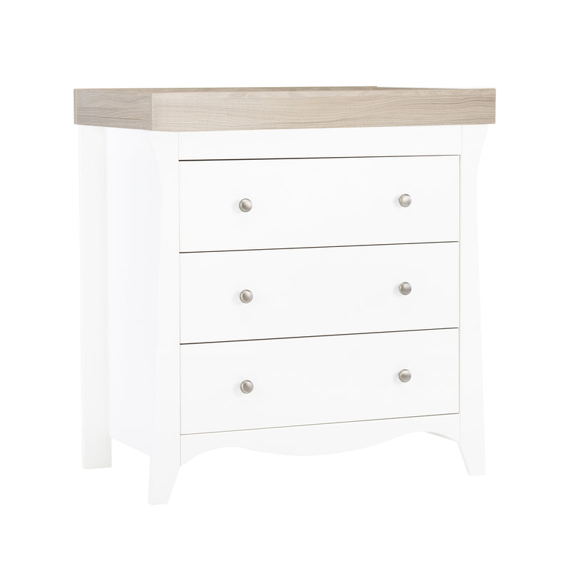 The side of the dresser of the White and Ash CuddleCo Clara 2pc Nursery Set - 3 Drawer Dresser/Changer & Cot Bed with the changing unit | Nursery Furniture Sets | Room Sets | Nursery Furniture - Clair de Lune UK