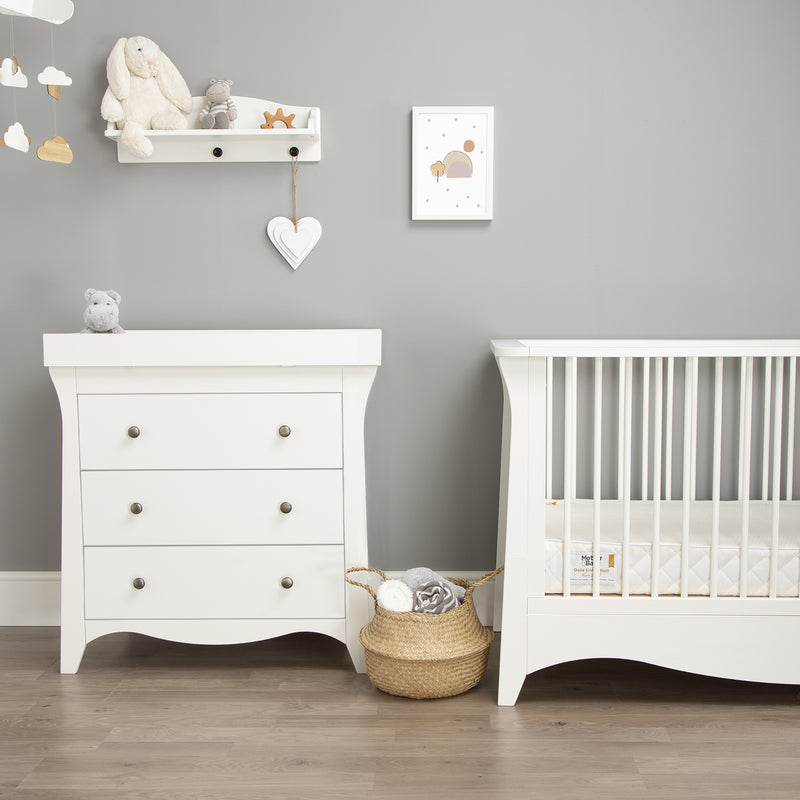White CuddleCo Clara 2pc Nursery Set - 3 Drawer Dresser/Changer & Cot Bed in a cloud-theme nursery | Nursery Furniture Sets | Room Sets | Nursery Furniture - Clair de Lune UK