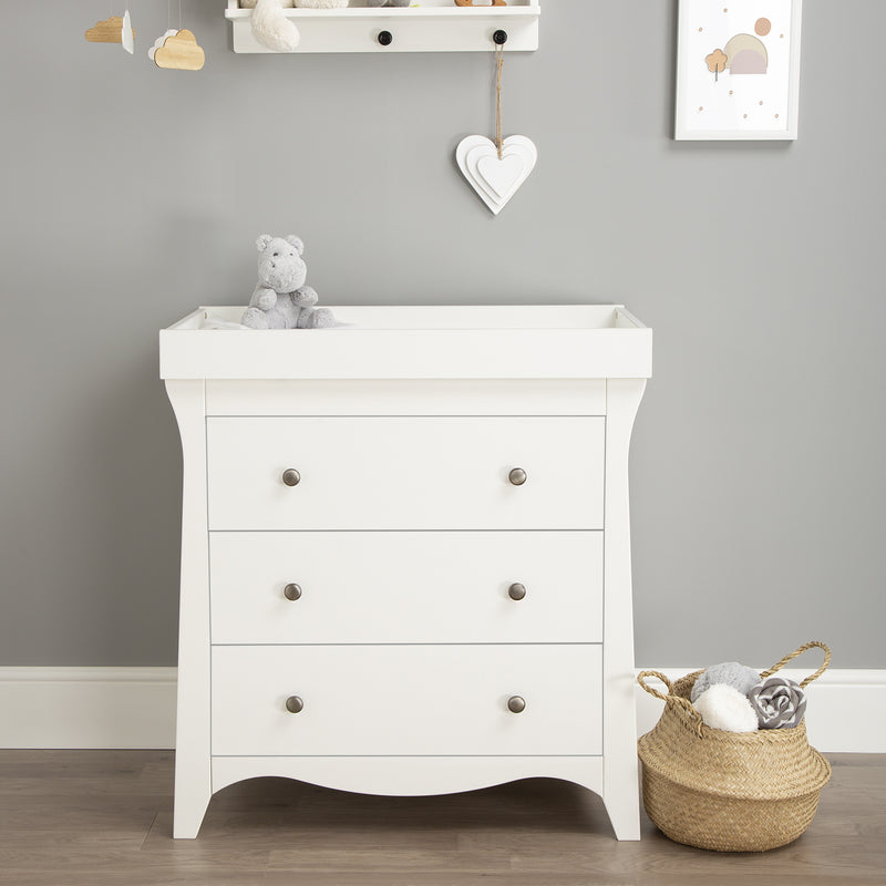 The dresser of the White CuddleCo Clara 2pc Nursery Set - 3 Drawer Dresser/Changer & Cot Bed | Nursery Furniture Sets | Room Sets | Nursery Furniture - Clair de Lune UK