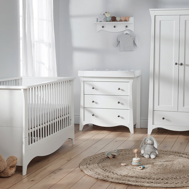 White CuddleCo Clara 3pc Nursery Set - 3 Drawer Dresser/Changer, Cot Bed & Wardrobe in a natural white gender-neutral nursery | Nursery Furniture Sets | Room Sets | Nursery Furniture - Clair de Lune UK