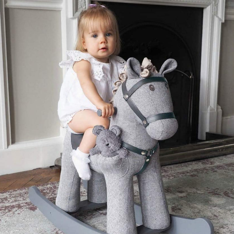 Little girl riding her Little Bird Told Me Stirling & Mac Rocking Horse | Rocking Animals | Montessori Activities For Babies & Kids | Toys | Baby Shower, Birthday & Christmas - Clair de Lune UK