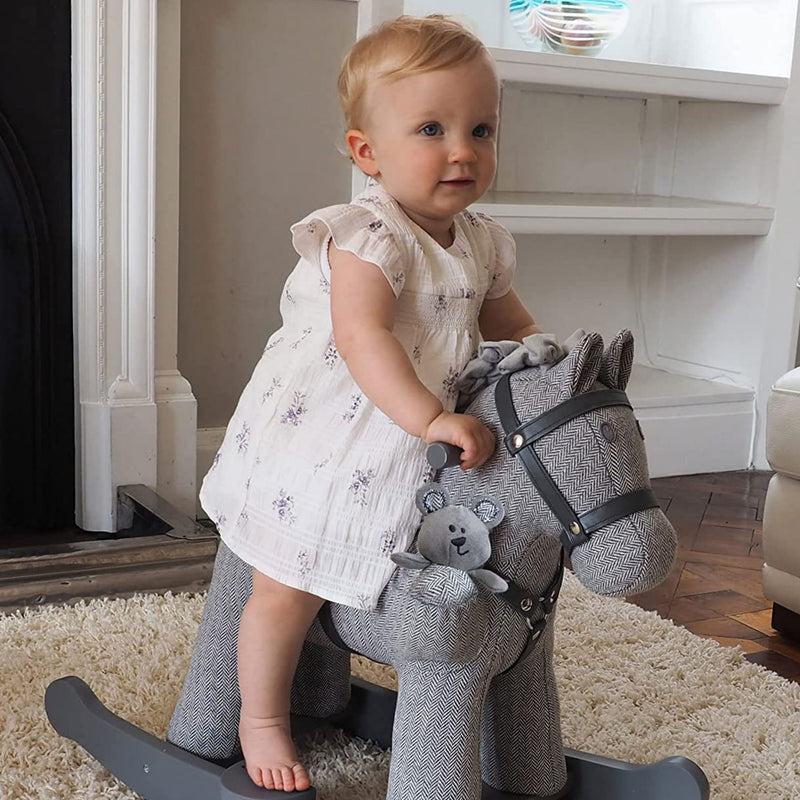 Little girl improving her sensory skills with her favourite Little Bird Told Me Stirling & Mac Rocking Horse | Rocking Animals | Montessori Activities For Babies & Kids | Toys | Baby Shower, Birthday & Christmas - Clair de Lune UK