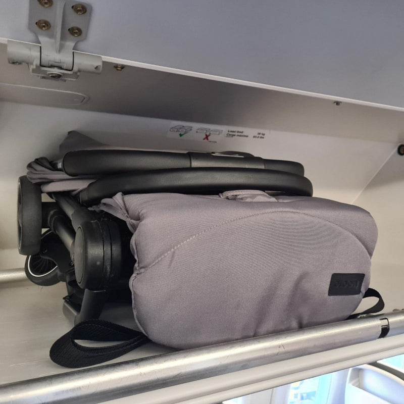  Folded Didofy Grey New Aster 2 Ultra-Compact Pushchair & Travel System on the overhead bin of an airplane as a carryon | Strollers, Pushchairs & Prams | Pushchairs, Carrycots & Car Seats Baby | Travel Essentials - Clair de Lune UK