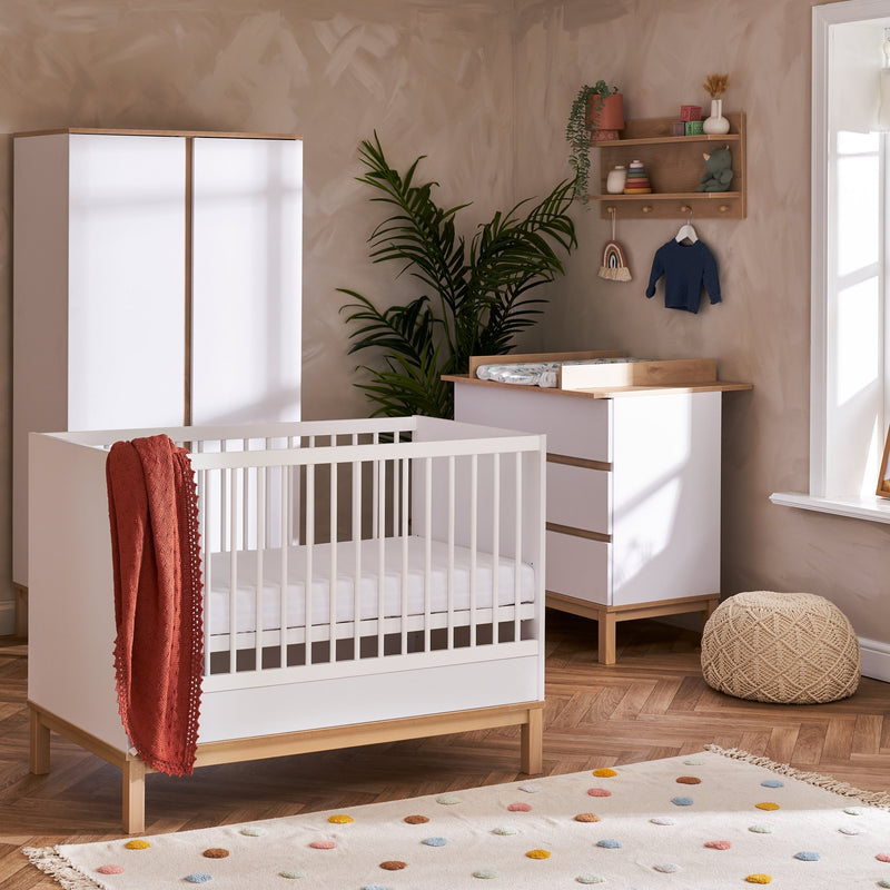 White and Natural Obaby Astrid Mini 3 Piece Room Set including a white cot bed, a matching wardrobe and a matching changer in a Scandi Cashmere nursery room | Nursery Furniture Sets | Room Sets | Nursery Furniture - Clair de Lune UK