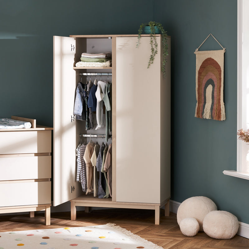 The wardrobe of the cot bed of the Natural Cashmere Obaby Astrid Mini 3 Piece Room Set in a Scandi pastel green nursery room | Nursery Furniture Sets | Room Sets | Nursery Furniture - Clair de Lune UK