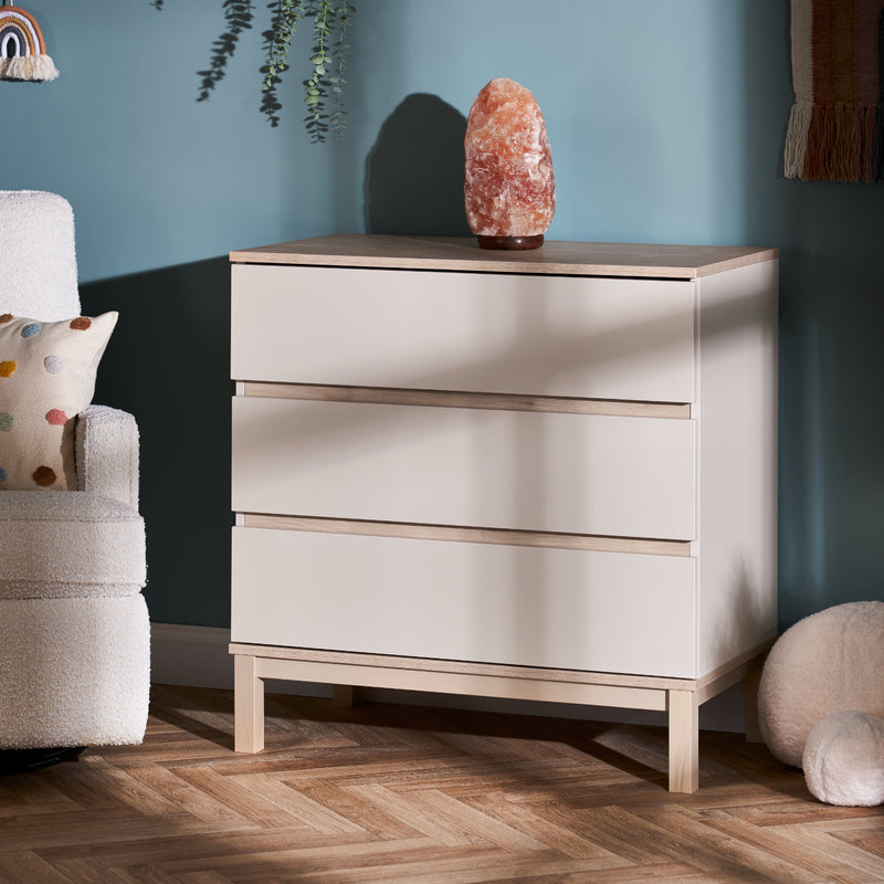 The dresser of the cot bed of the Natural Cashmere Obaby Astrid Mini 3 Piece Room Set in a Scandi pastel green nursery room | Nursery Furniture Sets | Room Sets | Nursery Furniture - Clair de Lune UK