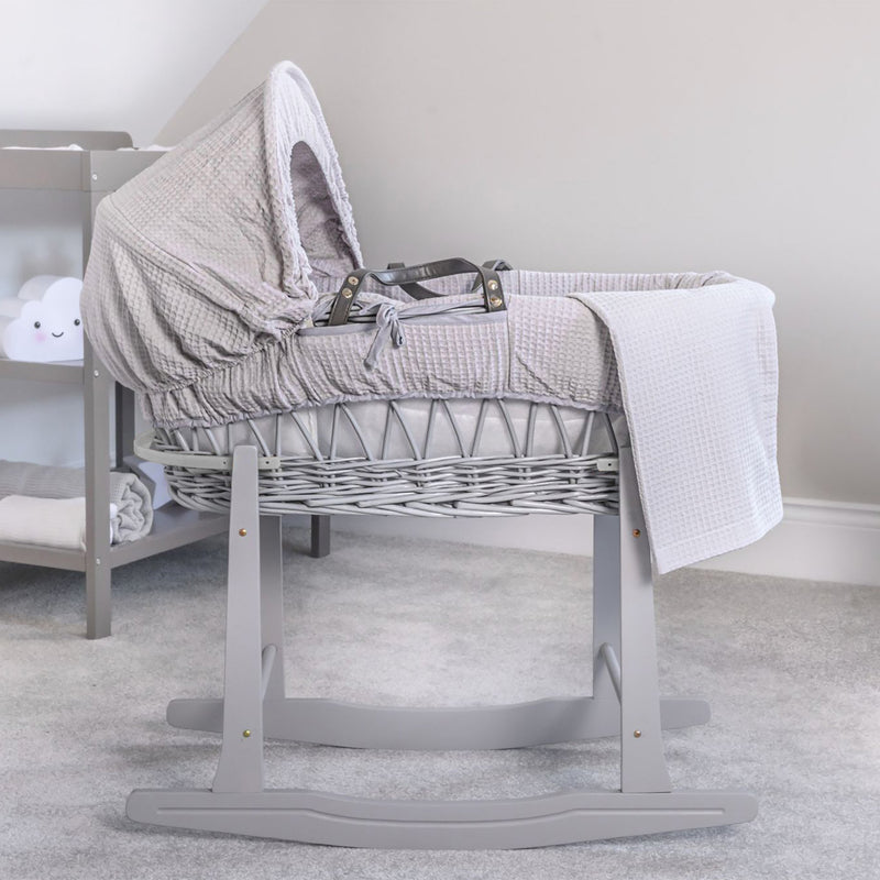Grey Waffle Grey Wicker Moses Basket on the Grey Deluxe Rocking Stand in a minimalist nursery | Co-sleepers | Nursery Furniture - Clair de Lune UK