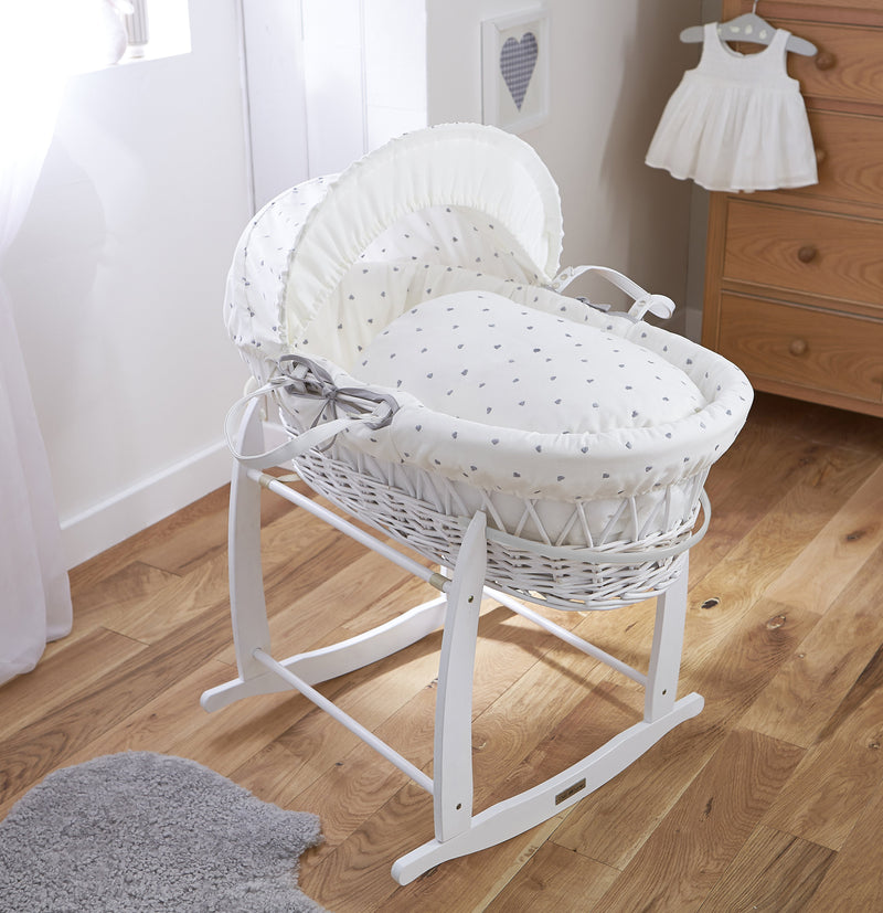 Lullaby Hearts White Wicker Moses Basket on the white Deluxe rocking stand in a gender-neutral nursery room | Moses Baskets | Co-sleepers | Nursery Furniture - Clair de Lune UK