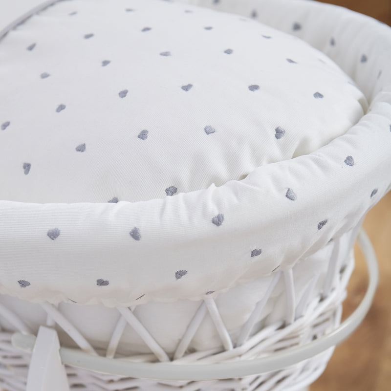 The embroidered hearts fabrics of the Lullaby Hearts White Wicker Moses Basket | Moses Baskets | Co-sleepers | Nursery Furniture - Clair de Lune UK