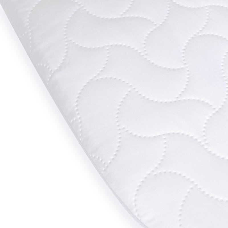 The quilted cover of the Quilted Microfibre Bedside Crib Mattress (76 x 40 cm) | Bedside & Folding Crib Mattresses | Baby Mattresses | Bedding | Nursery Furniture - Clair de Lune UK