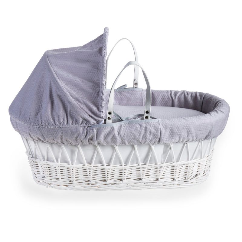 Clair de Lune Cotton Dream White Wicker Moses Basket coming complete with detachable, adjustable hood, hypoallergenic mattress and coverlet horizontally.