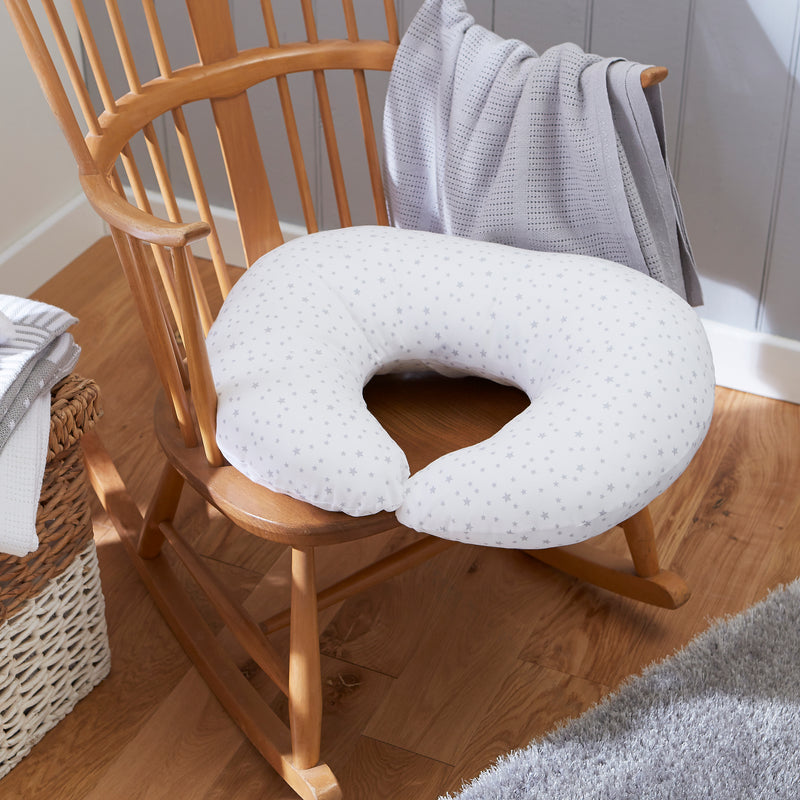 Grey Stars & Stripes Nursing Pillow on a brown wooden nursing rocking chair | Pregnancy & Feeding Pillows - Clair de Lune UK