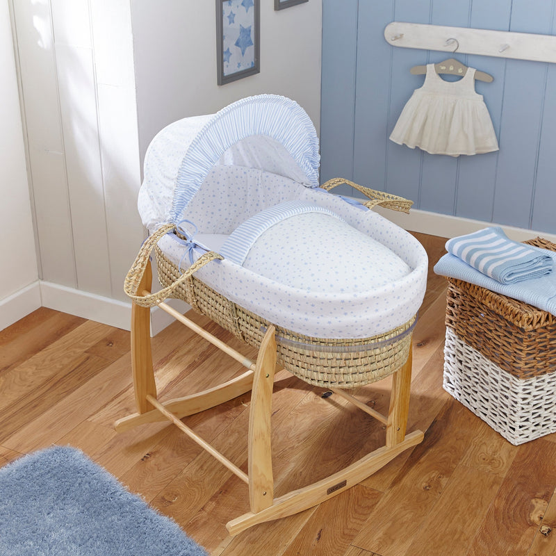 Blue Stars & Stripes Palm Moses Basket on the Natural Deluxe Rocking Stand in a minimalist nursery room | Moses Baskets | Co-sleepers | Nursery Furniture - Clair de Lune UK