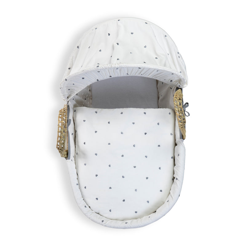 Lullaby Hearts Palm Moses Basket showcasing the traditional Moses hood, matching coverlet, sturdy palm handles and mattress included | Co-sleepers | Nursery Furniture - Clair de Lune UK