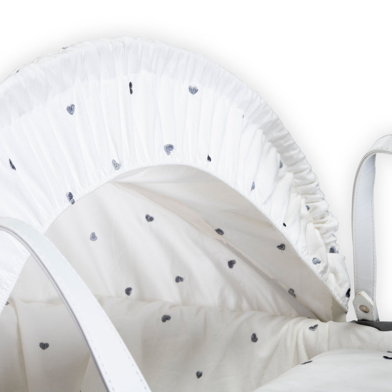 The hood and handles of the Lullaby Hearts White Wicker Moses Basket | Moses Baskets | Co-sleepers | Nursery Furniture - Clair de Lune UK