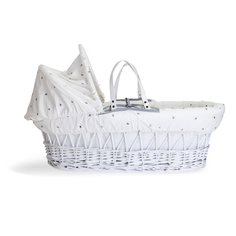 The side of the of the Lullaby Hearts White Wicker Moses Basket | Moses Baskets | Co-sleepers | Nursery Furniture - Clair de Lune UK