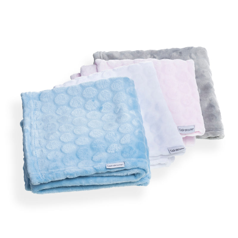 A stack of four folded Marshmallow Baby Blankets in pink, blue, white and grey | Cosy Baby Blankets | Nursery Bedding | Newborn, Baby and Toddler Essentials - Clair de Lune UK