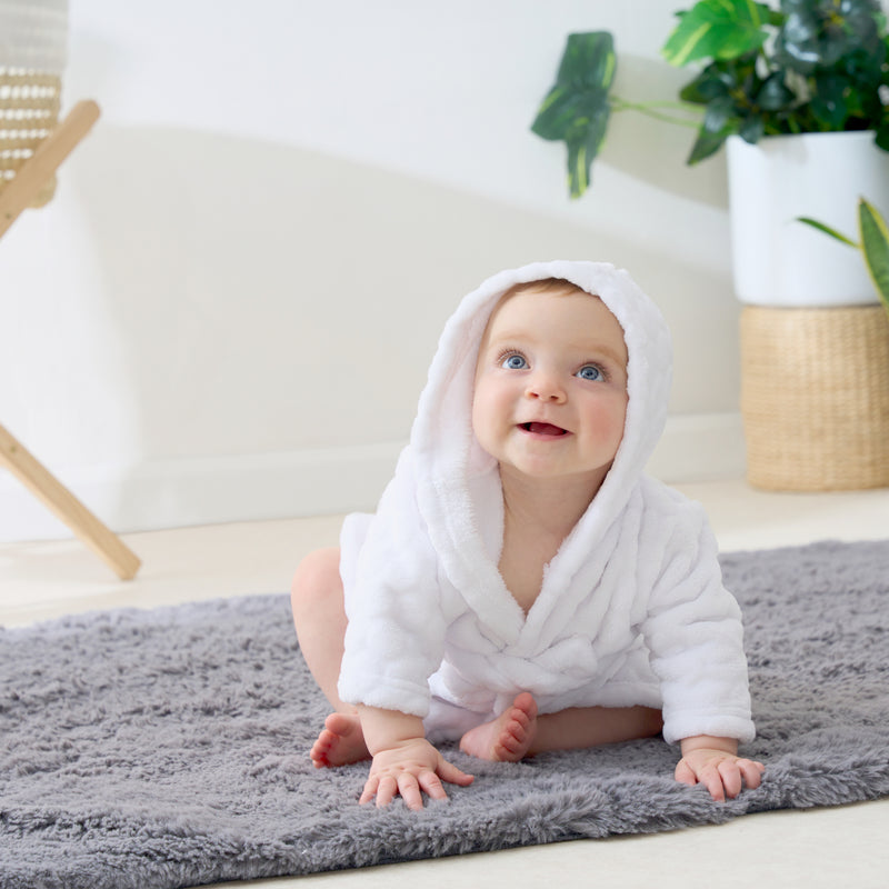 Baby wearing Komfies Marshmallow Baby Dressing Gown | Dressing Gowns & Ponchos | Bathing & Changing Essentials - Clair de Lune UK