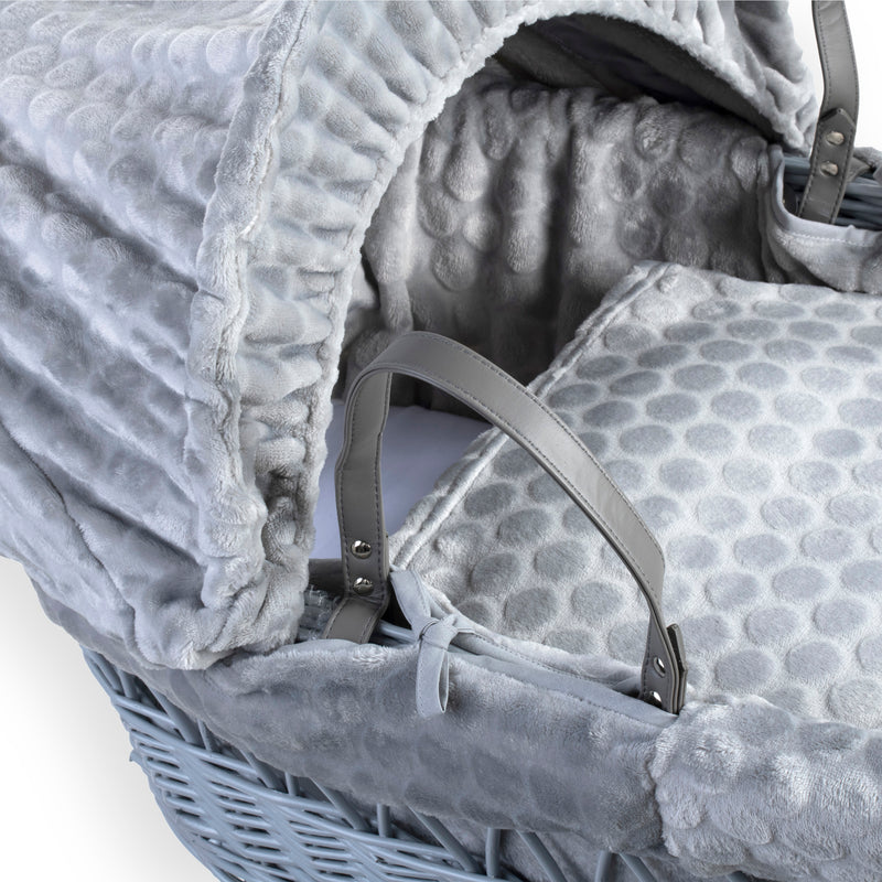 Grey Marshmallow Grey Wicker Moses Basket showing the sturdy vegan leather carry handles, traditional hood, supportive mattress, bassinet dressing and coverlet made from the breathable grey waffle fabrics | Moses Baskets | Co-sleepers | Nursery Furniture 