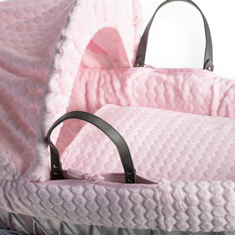 Pink Marshmallow Grey Wicker Moses Basket showing the sturdy vegan leather carry handles, traditional hood, bassinet dressing and coverlet made from the breathable pink waffle fabrics | Moses Baskets | Co-sleepers | Nursery Furniture - Clair de Lune UK