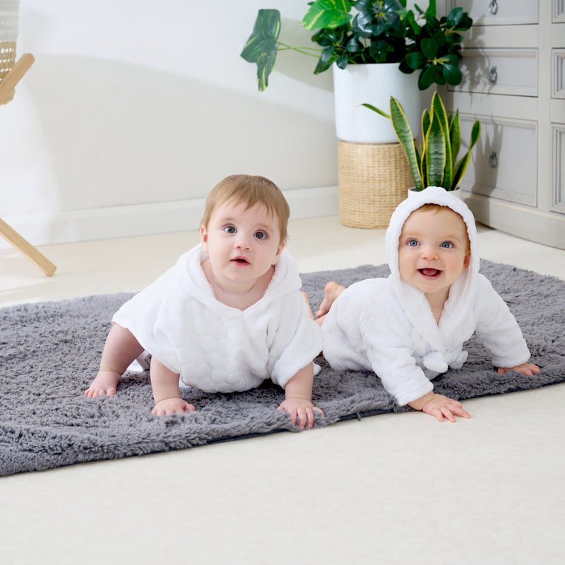Babies wearing Komfies Marshmallow Baby Dressing Gown | Dressing Gowns & Ponchos | Bathing & Changing Essentials - Clair de Lune UK