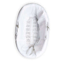 The front of the Quilted Liner for Moses Basket on a white wicker moses basket | Moses Baby Basket Dressing | Nursery Bedding | Moses Basket Accessories  - Clair de Lune UK