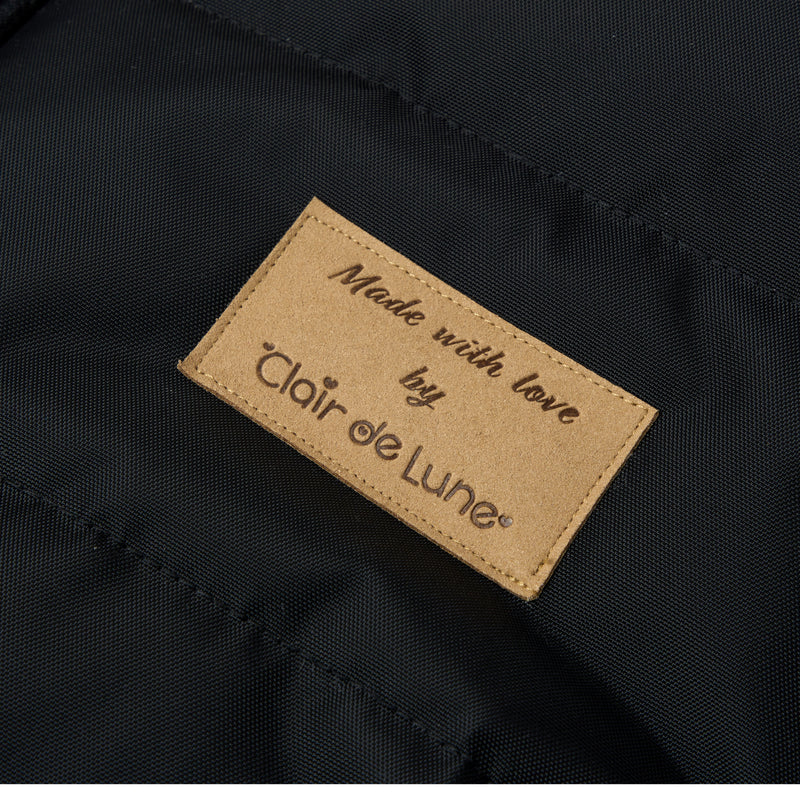 The Clair de Lune vegan leather label on the Black Snug Pushchair Footmuff | Pushchair Cosytoes & Footmuffs | Travel Accessories - Clair de Lune UK