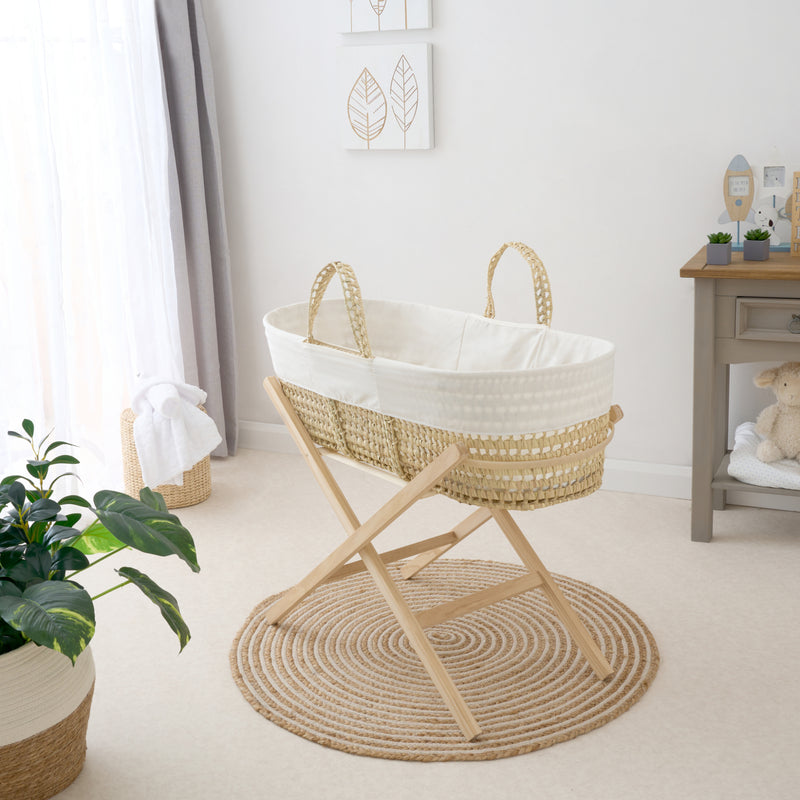 Cream Scandi Palm Moses Basket on the Clair de Lune Natural Compact Folding Moses Stand in a Scandi style nursery | Moses Baskets and Stands | Co-sleepers | Nursery Furniture - Clair de Lune UK