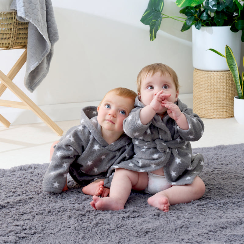 Babies wearing Komfies Star Fleece Dressing Gown (6-12 months) | Dressing Gowns & Ponchos | Bathing & Changing Essentials - Clair de Lune UK