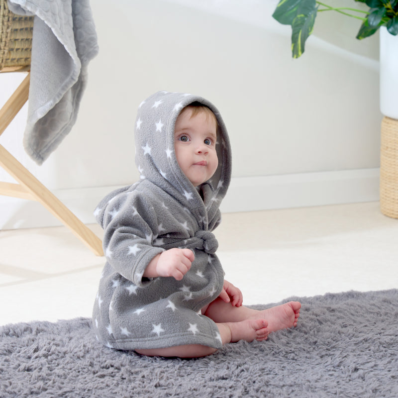 Baby wearing Komfies Star Fleece Dressing Gown (6-12 months) | Dressing Gowns & Ponchos | Bathing & Changing Essentials - Clair de Lune UK