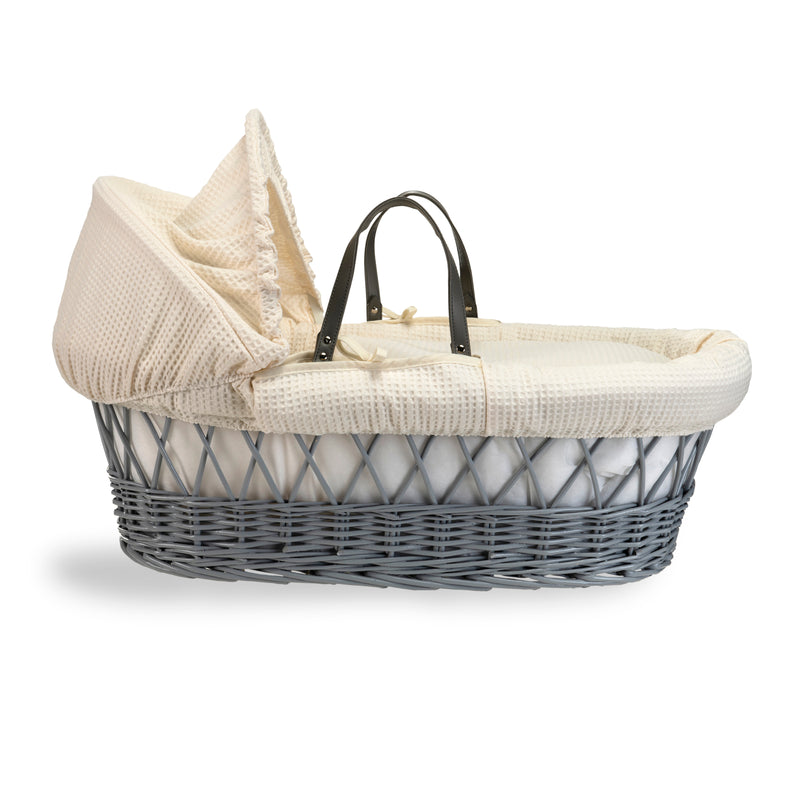 Cream Waffle Grey Wicker Moses Basket coming complete with an adjustable, removable hood, padded liner that covers the interior walls of the basket, two carry handles, a coverlet, and a firm, hypoallergenic fibre mattress | Moses Baskets | Co-sleepers | N