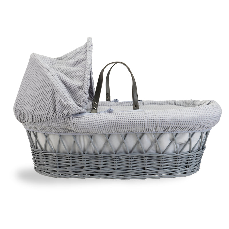Grey Waffle Grey Wicker Moses Basket coming complete with an adjustable, removable hood, padded liner that covers the interior walls of the basket, two carry handles, a coverlet, and a firm, hypoallergenic fibre mattress | Co-sleepers | Nursery Furniture