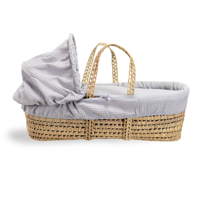 Grey Waffle Palm Moses Basket showing the palm and hood to create a traditional yet cosy sleeping space for babies | Moses Baskets | Co-sleepers | Nursery Furniture - Clair de Lune UK