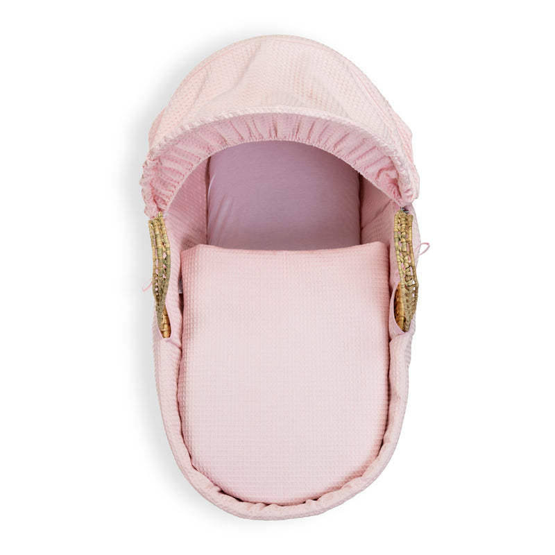 Pink Waffle Palm Moses Basket showcasing the coverlet, mattress and the hood | Moses Baskets | Co-sleepers | Nursery Furniture - Clair de Lune UK