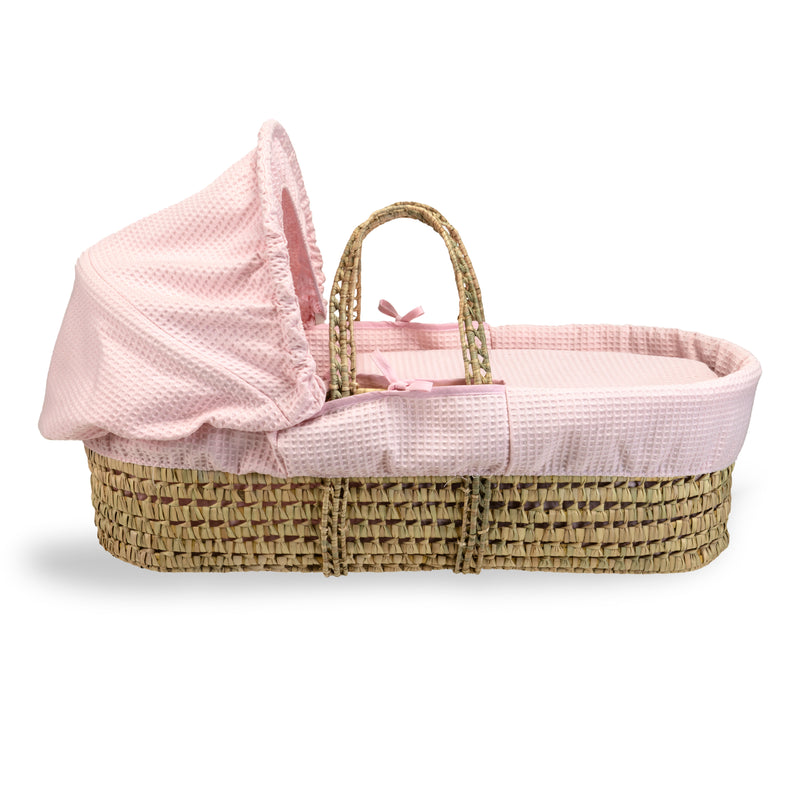 Pink Waffle Palm Moses Basket showing the palm and hood to create a traditional yet cosy sleeping space for babies | Moses Baskets | Co-sleepers | Nursery Furniture - Clair de Lune UK