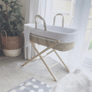 Special Buy - Star Palm Moses Basket with Stand Bundle & Blanket in the sunlight on a rug in the living room | Moses Baby Baskets, Bassinets | Nursery Furniture - Clair de Lune UK
