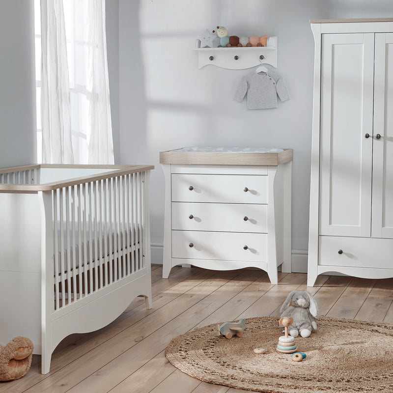 Ash CuddleCo Clara 3pc Nursery Set - 3 Drawer Dresser/Changer, Cot Bed & Wardrobe in a natural white gender-neutral nursery | Nursery Furniture Sets | Room Sets | Nursery Furniture - Clair de Lune UK