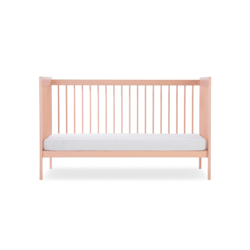 The pastel pink cot bed of the Blush Pink CuddleCo Nola 2 Piece Room Set transformed to a toddler bed | Nursery Furniture Sets | Room Sets | Nursery Furniture - Clair de Lune UK