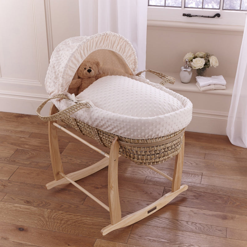 Cream Dimple Palm Moses Basket on the Natural Deluxe Rocking Stand in a minimalist bedroom | Moses Baskets and Stands | Co-sleepers | Nursery Furniture - Clair de Lune UK