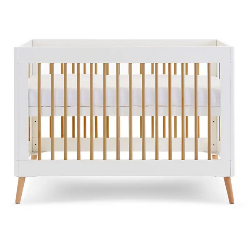 The white cot bed of the Obaby Maya Mini 2 Piece Room Set in white | Nursery Furniture Sets | Room Sets | Nursery Furniture - Clair de Lune UK