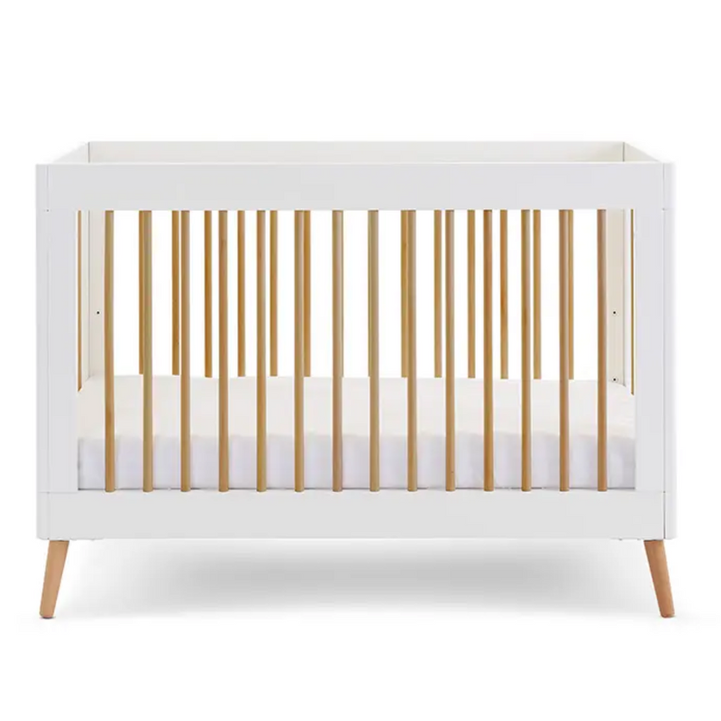 The white cot bed of the Obaby Maya Mini 2 Piece Room Set in white with the lower base | Nursery Furniture Sets | Room Sets | Nursery Furniture - Clair de Lune UK