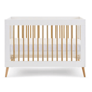 The cot bed of the White Obaby Maya Mini 3 Piece Room Set with the platform on the medium level | Nursery Furniture Sets | Room Sets | Nursery Furniture - Clair de Lune UK