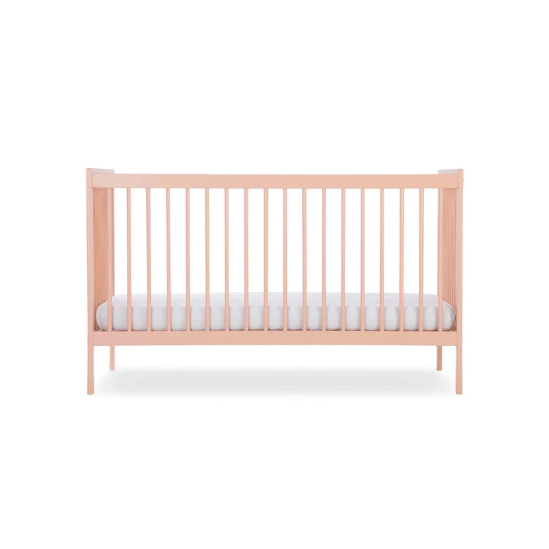 The pastel pink cot bed of the Blush Pink CuddleCo Nola 2 Piece Room Set | Nursery Furniture Sets | Room Sets | Nursery Furniture - Clair de Lune UK